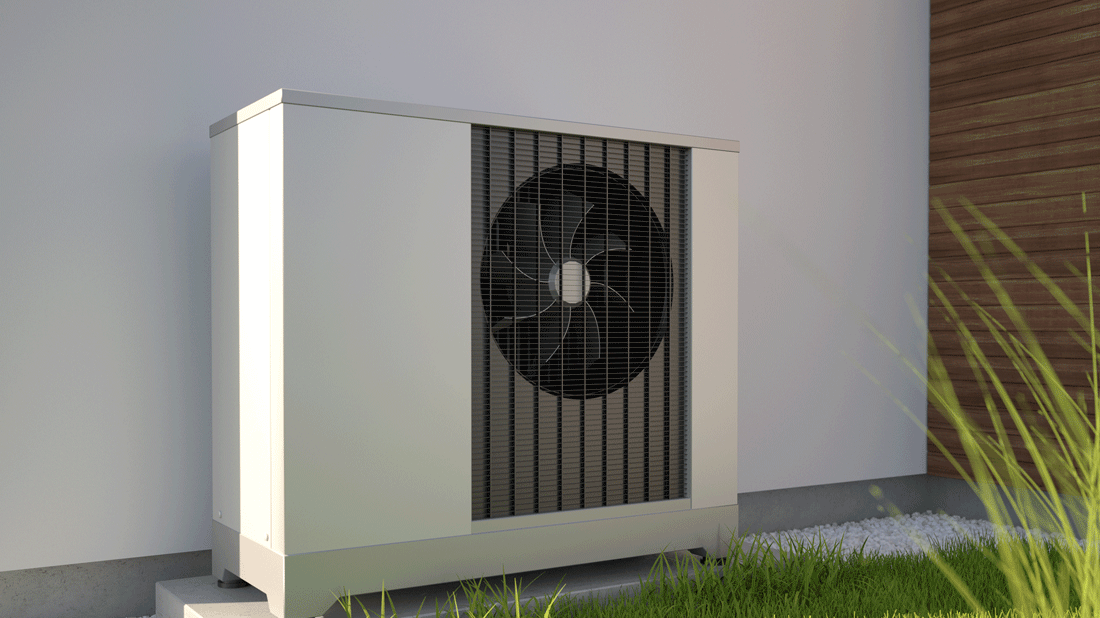 Wärmepumpe auf einer Wiese